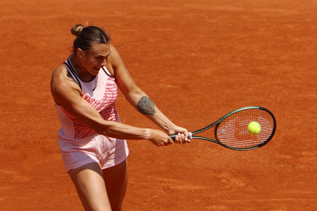Sabalenka plays a backhand against Svitolina.