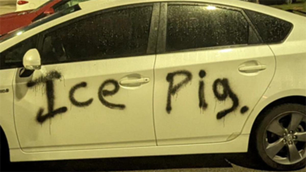 Prairieland Detention Center "ICE pig" graffiti on vehicle