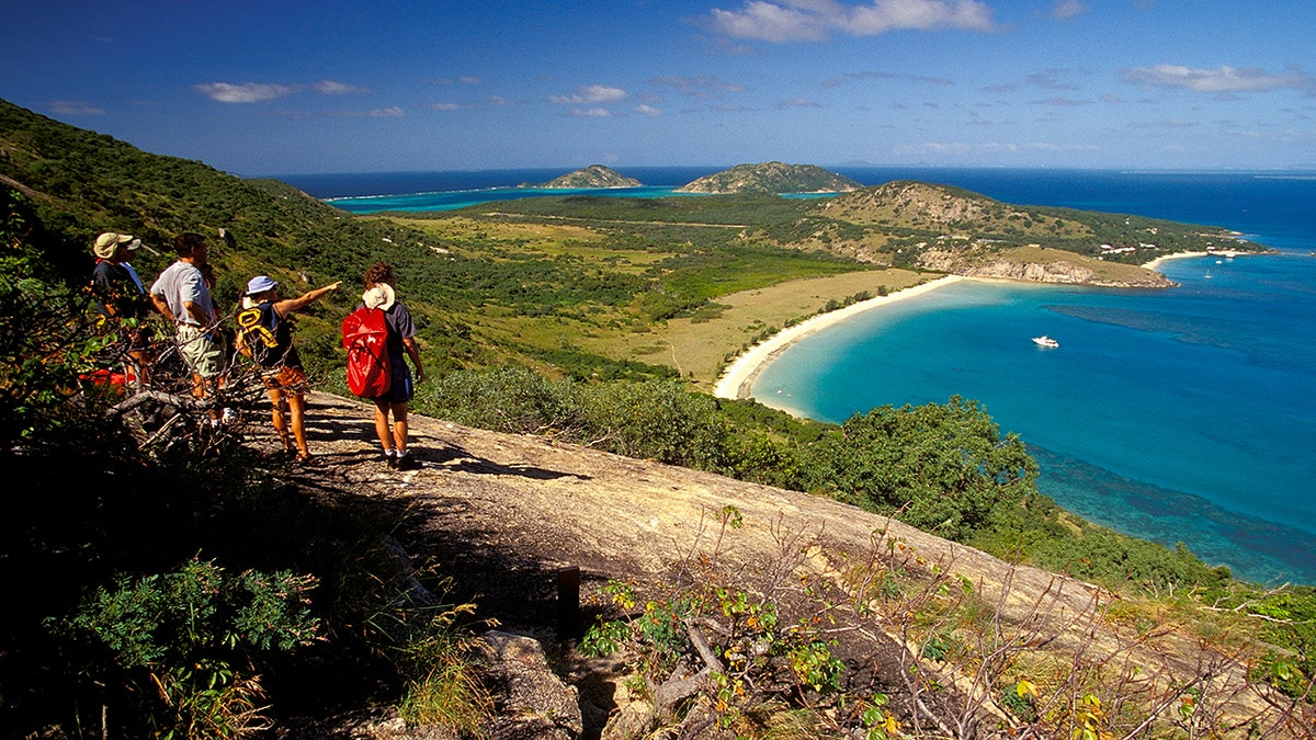 Hikers on Lizard Island off the coast of Australia